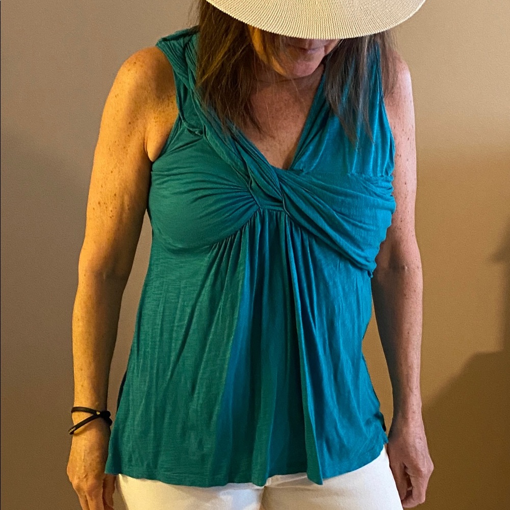 Teal sleeveless blouse
